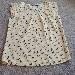 Allegra K cream and black bird blouse